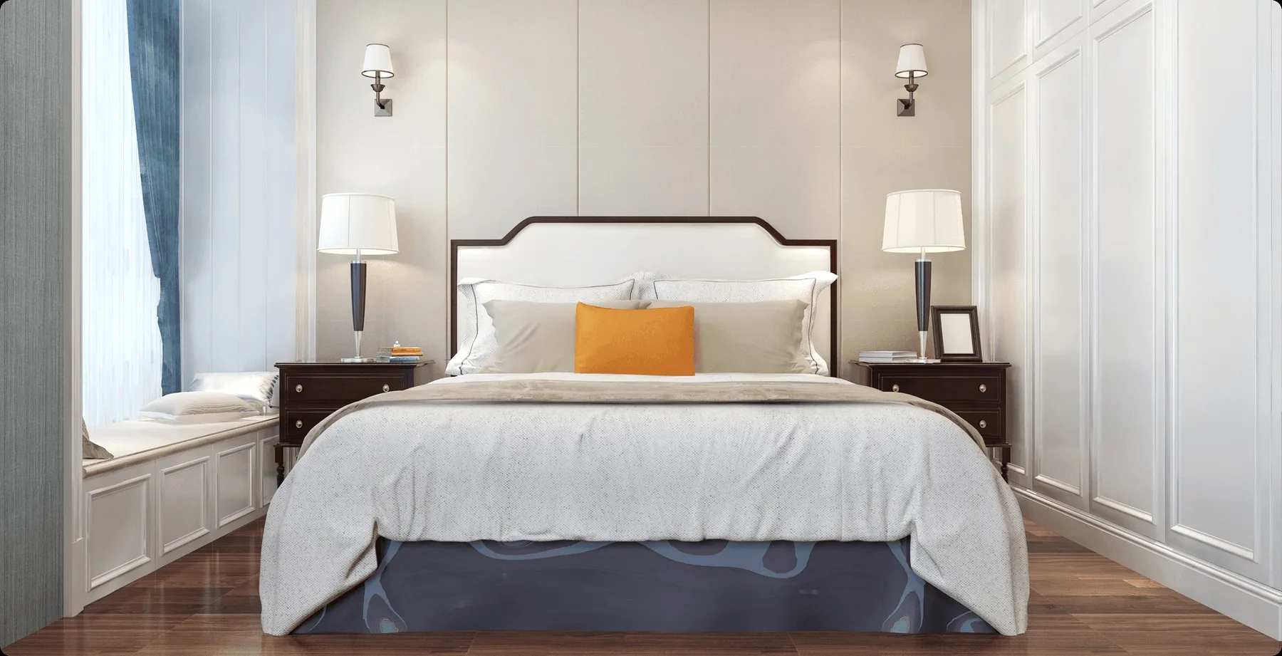 A bedroom with white panelling and an orange cushion.