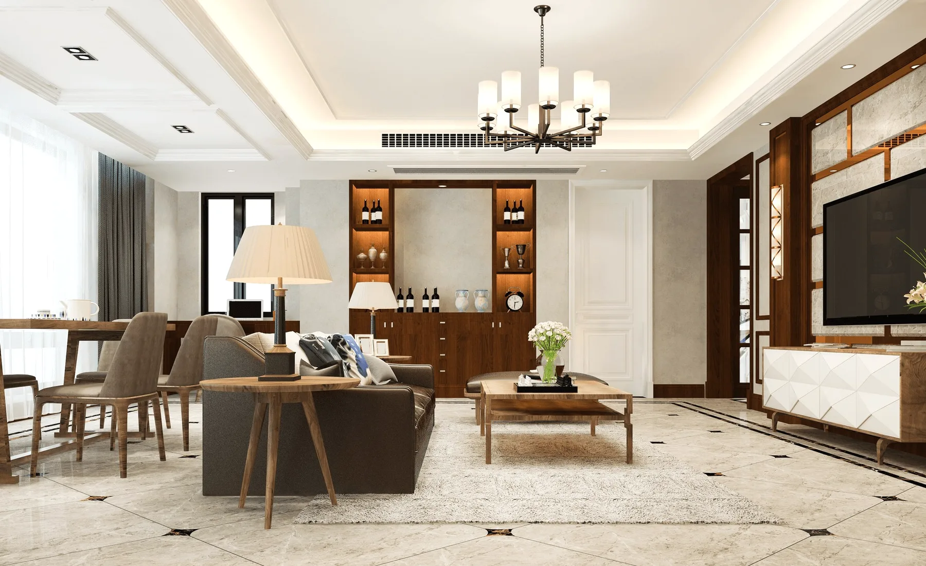 A living room with a chandelier, wooden cabinets and a grey sofa.