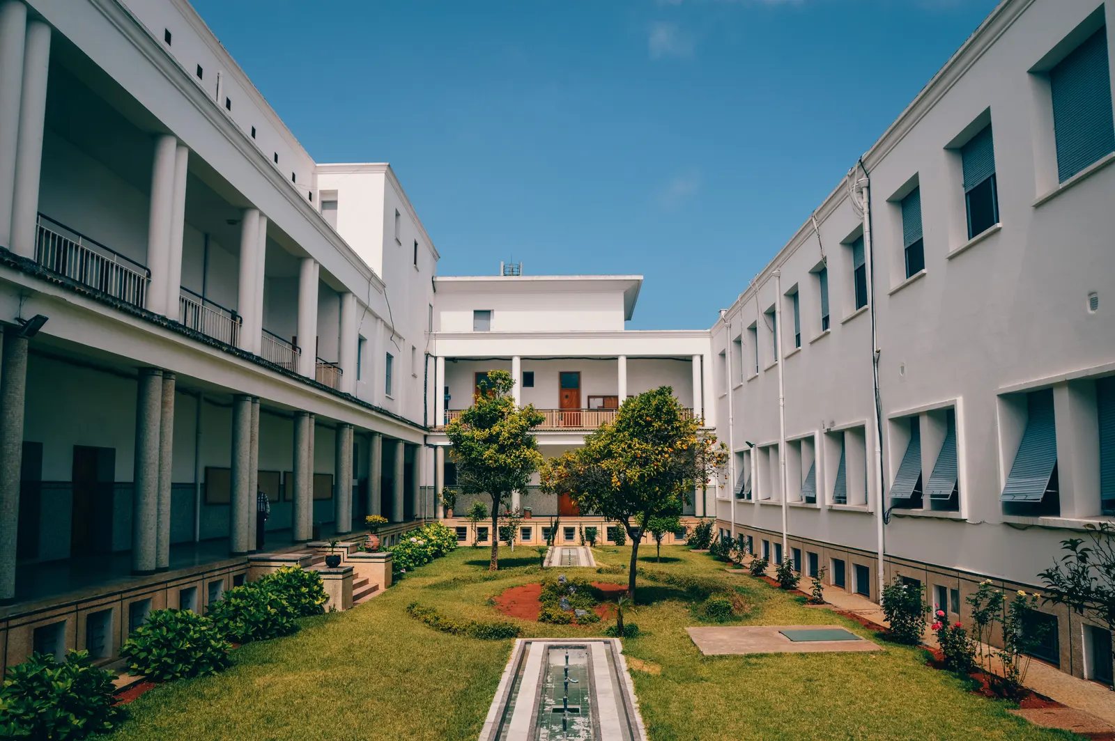 A school campus seen from the grounds in daylight, with no one posed for the camera.
