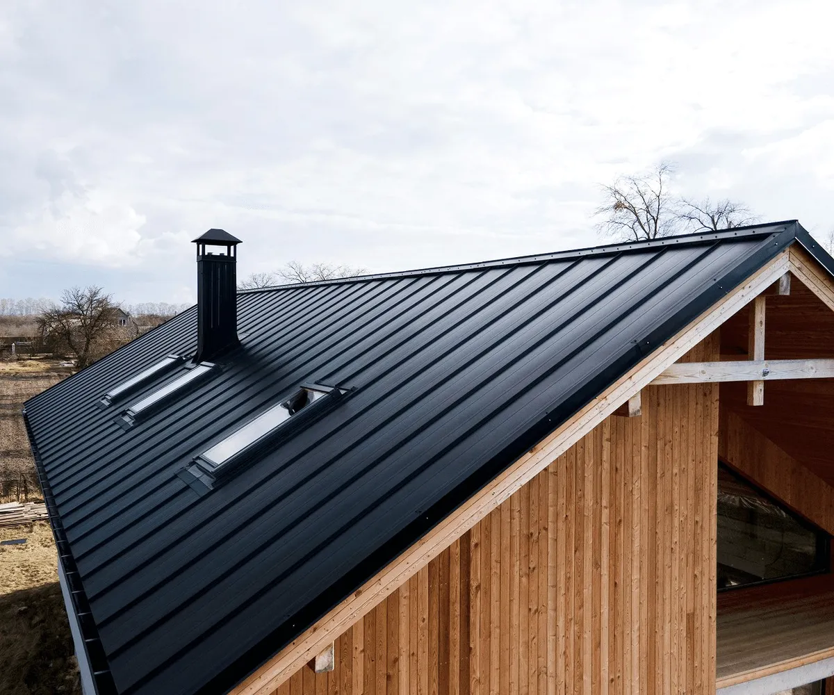 A metal roof with a skylight.