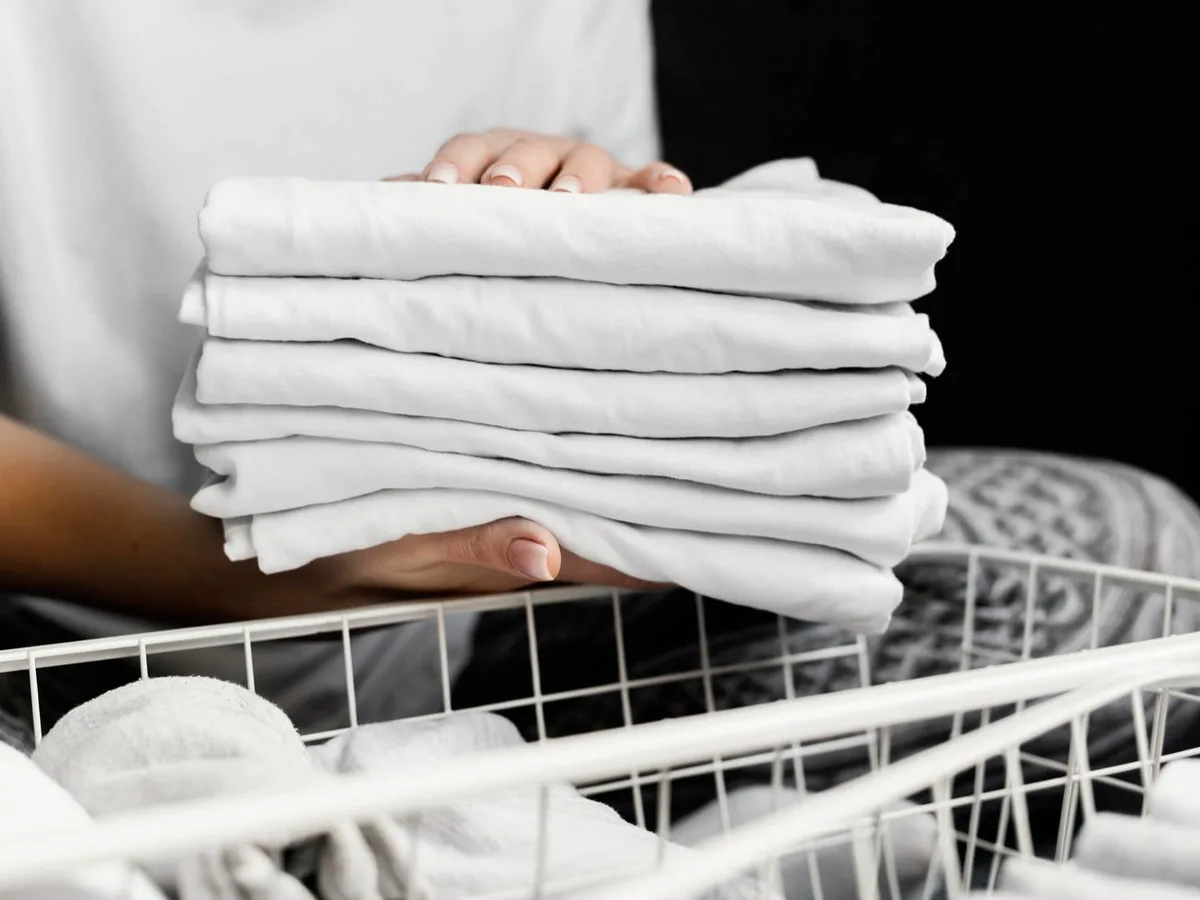 A stack of folded white towels.